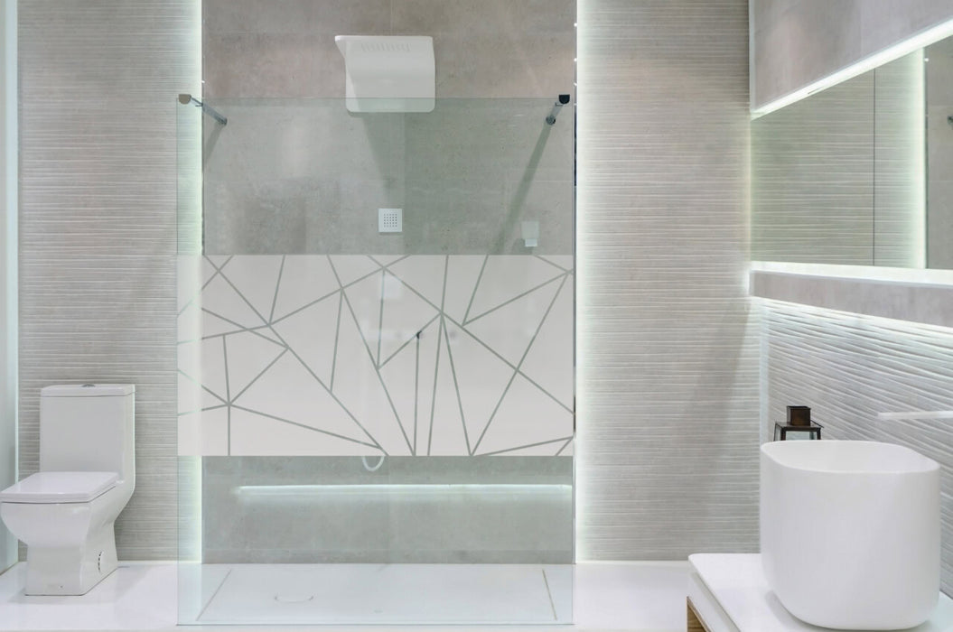 Bathroom interior with white walls, a shower cabin with glass wa