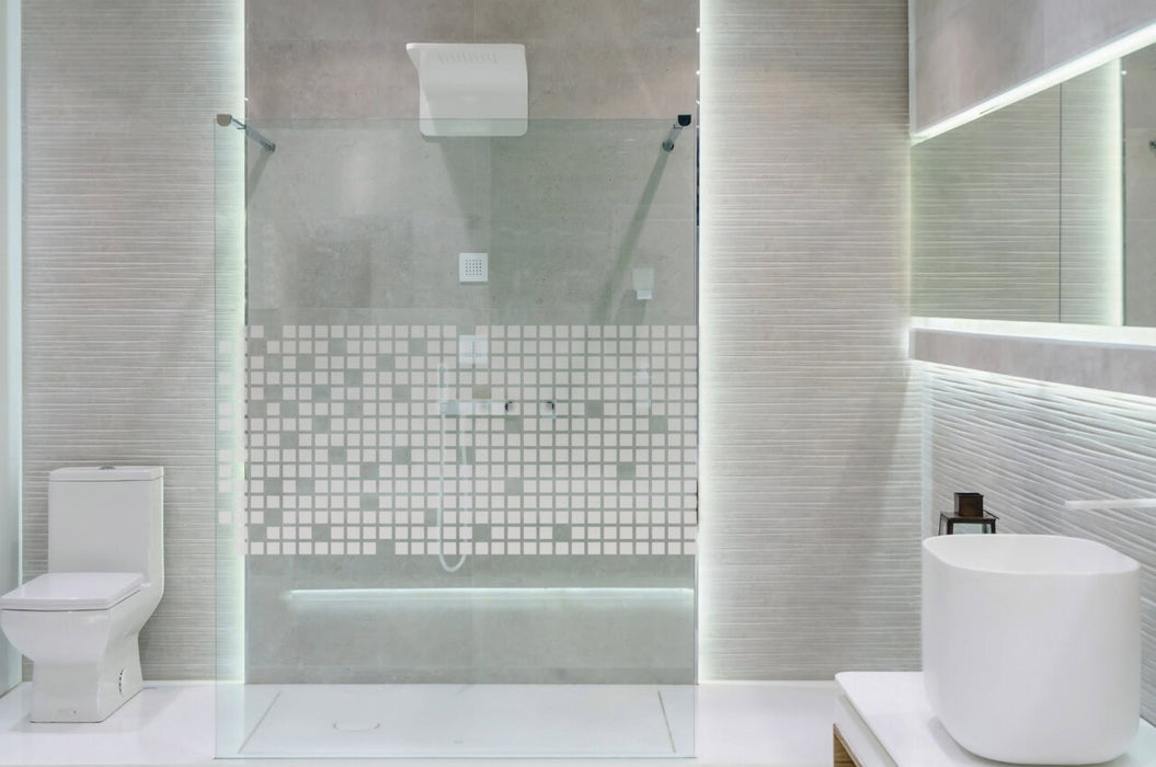 Bathroom interior with white walls, a shower cabin with glass wa