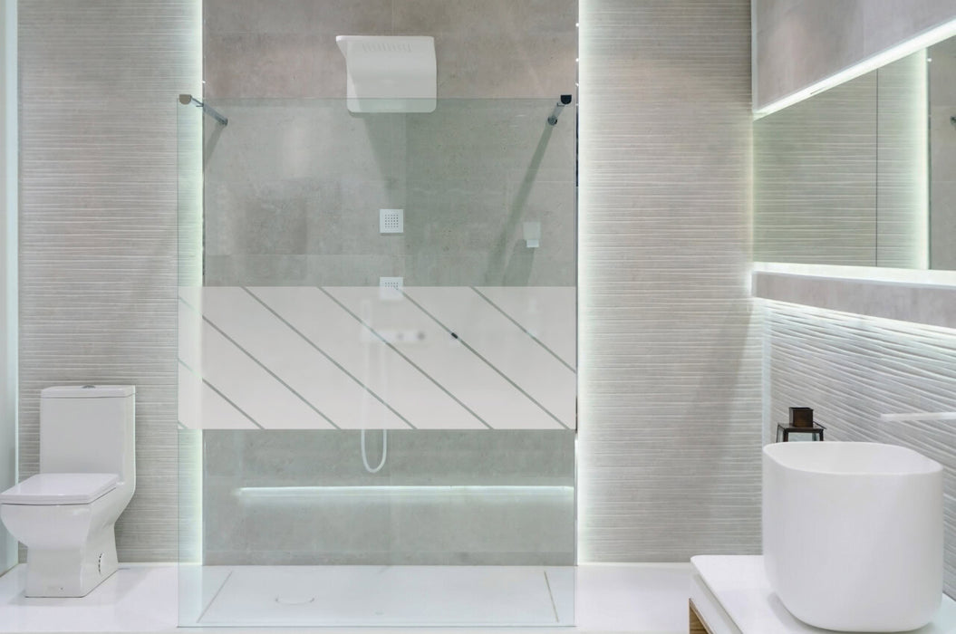 Bathroom interior with white walls, a shower cabin with glass wa