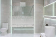 Bathroom interior with white walls, a shower cabin with glass wa