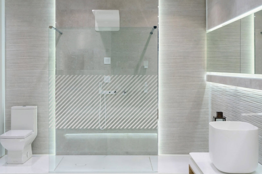 Bathroom interior with white walls, a shower cabin with glass wa