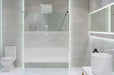 Bathroom interior with white walls, a shower cabin with glass wa